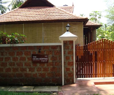 https://imgcld.yatra.com/ytimages/image/upload/t_hotel_yatra_city_desktop/v1440819260/Domestic Hotels/Hotels_Cochin/The Cochin Heritage Home/Entrance.jpg